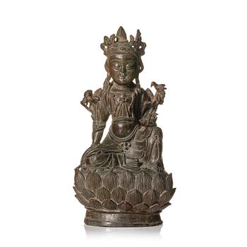 A bronze figure of Guanyin, late Ming dynasty (1368-1644).