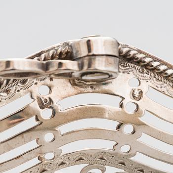 A George III sterling silver breadbasket, maker's mark of William Plummer, London 1777.