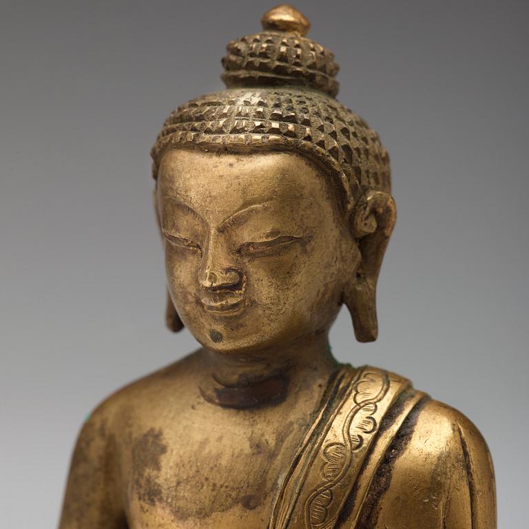 Two copper alloy figures of buddha, Sino-Tibetan, circa 1900.