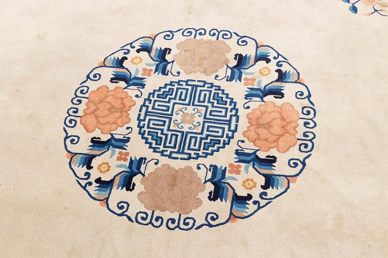 A carpet, China, Antique finish, ca 362 x 275 cm.