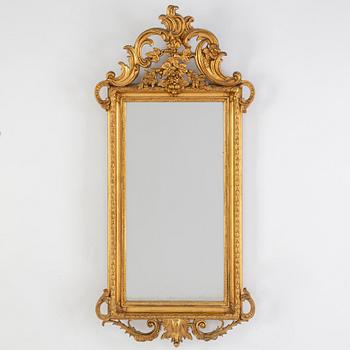 A late 19th Century rococo style mirror.