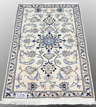 Two Nain rugs, ca 138 x 70 and 140 x 70 cm.