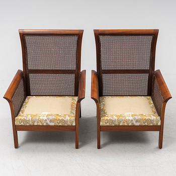 Arne Norell, a pair of 'Rotang' easy chairs, Norell Möbel AB, Sweden.