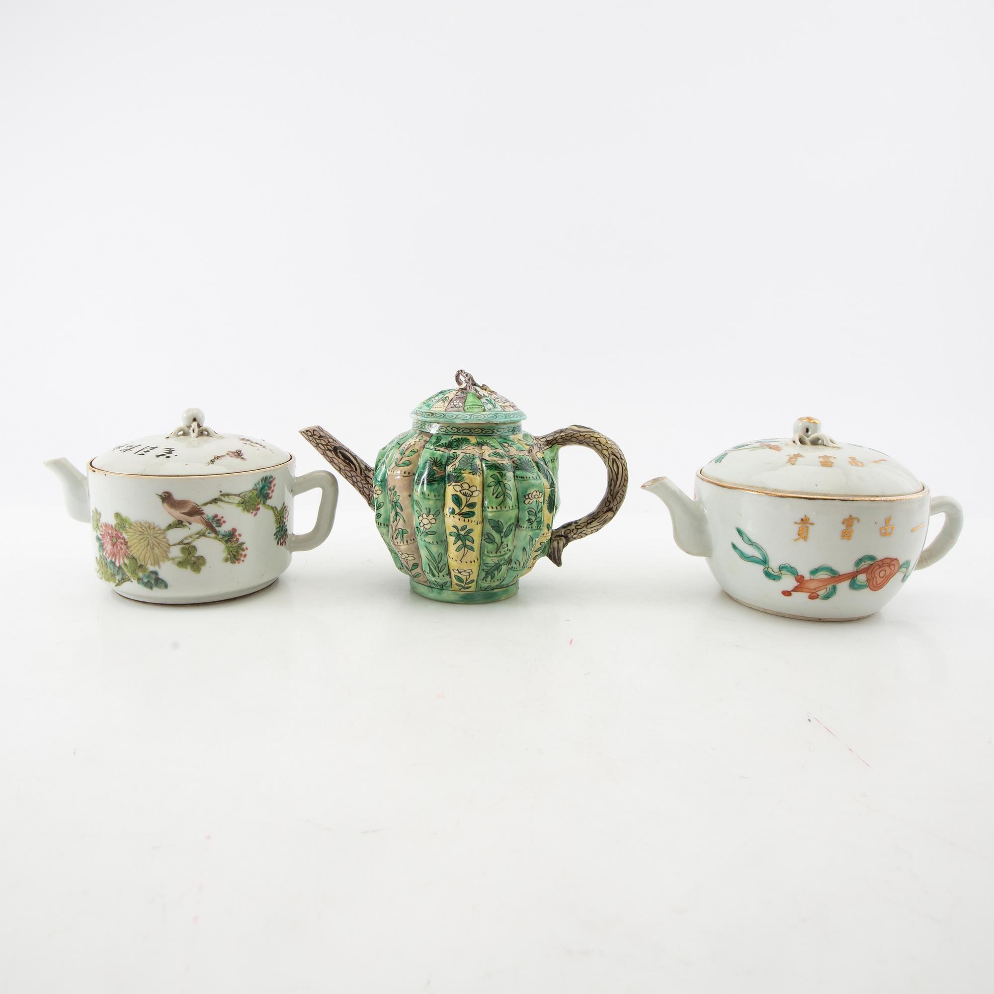 A set of three differently decorated tea pots with covers, Qing dynasty, 18century and 20th century.
