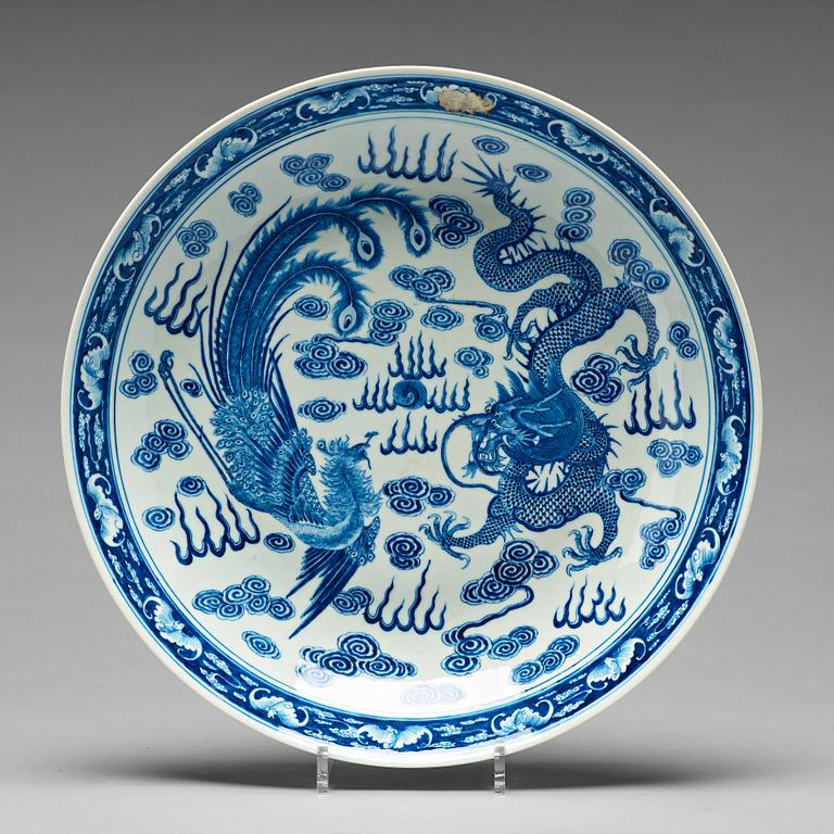 A large blue and white dish, Qing dynasty, late 19th century.