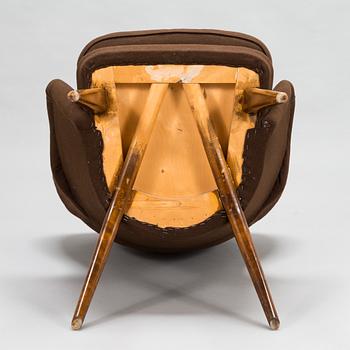 Carl Gustaf Hiort af Ornäs, A mid-20th-century armchair 'Siesta' manufacturer Puunveisto Oy - Träsnideri Ab, Finland.