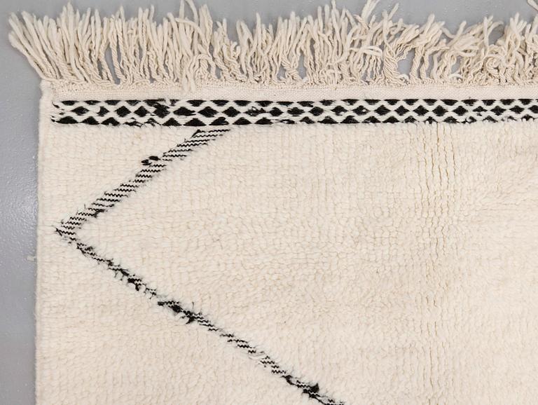 A moroccan carpet, ca 300 x 200 cm.