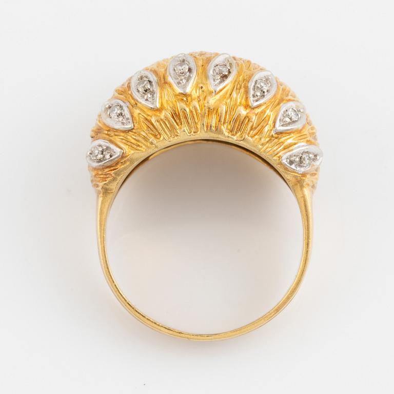 Gold and eight diamond ring.