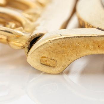 Rolex, 18K gold, with an 18K gold bracelet, wristwatch, 31.5 mm.