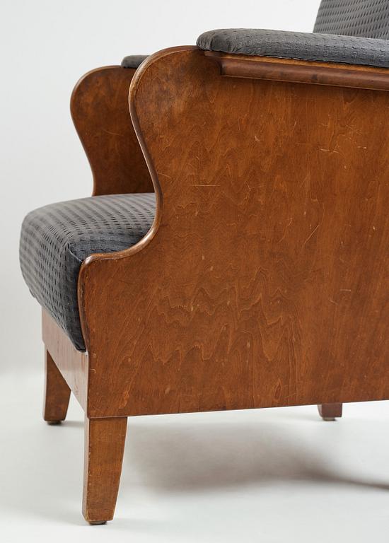 Carl Bergsten, a stained birch easy chair, Nordiska Kompaniet, Sweden 1918.