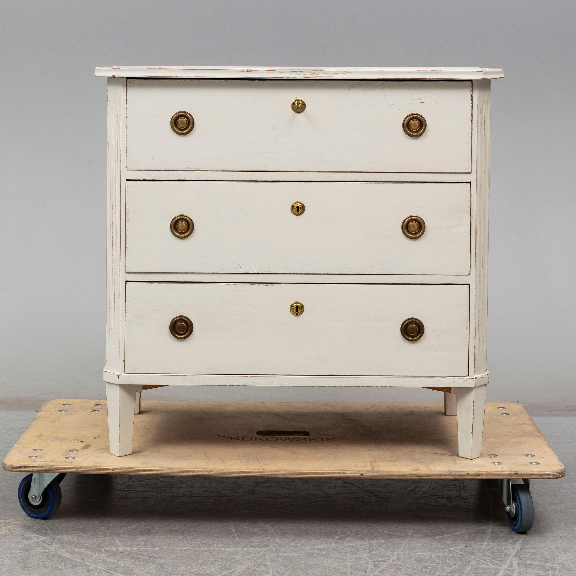 a gustavian style chest of drawers from the first half of the 20th century.