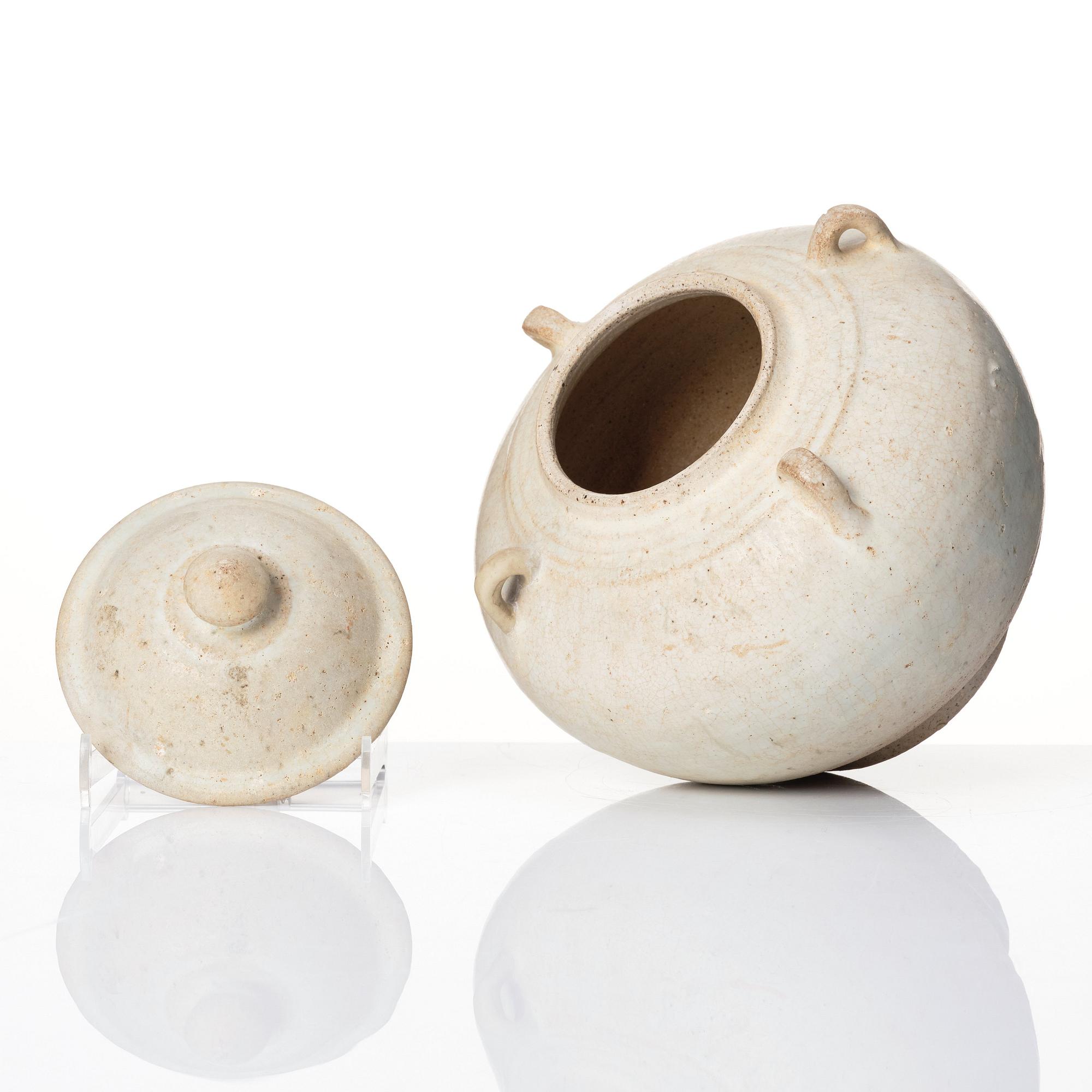 A Thai jar with cover, Sawankhalok, 14th/15th century.