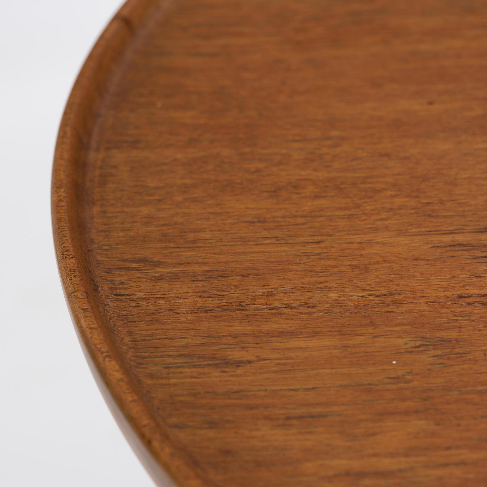 Ejner Larsen & Aksel Bender Madsen, a circular teak table model "1804", cabinetmaker Willy Beck, Copenhagen, 1950s.