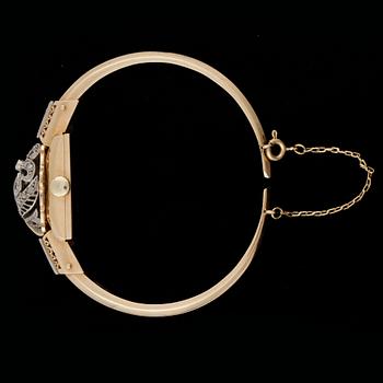 ARMBANDSUR, dam, 18k guld med rosenstenar, Vasa, 1960-tal. Vikt 23,4g.