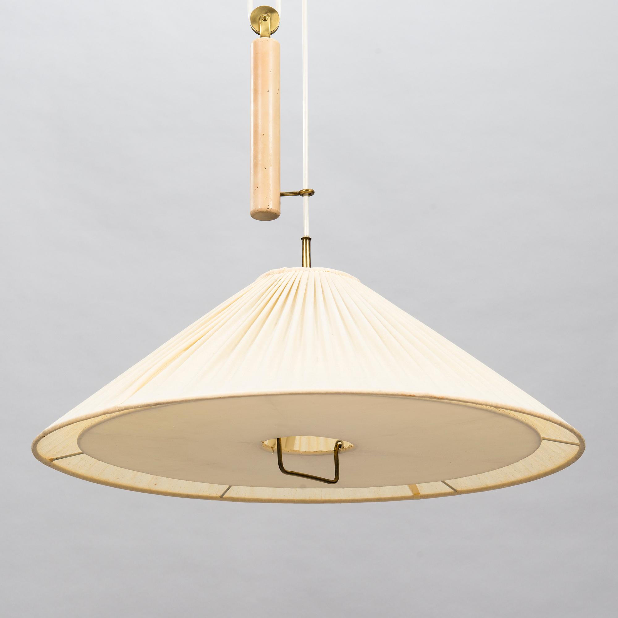 A mid-20th Century ceiling light, model A1998, for Taito Finland.