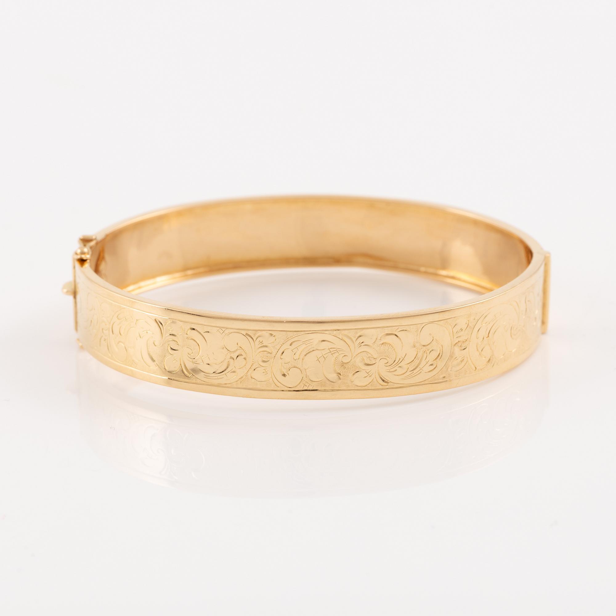 Arm ring 18K gold.