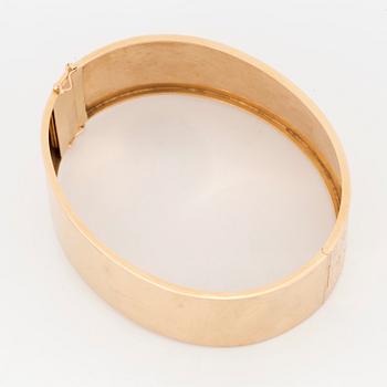 A BANGLE.