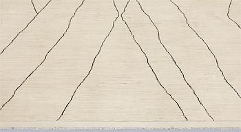 A Moroccan carpet, 335 x 258 cm.