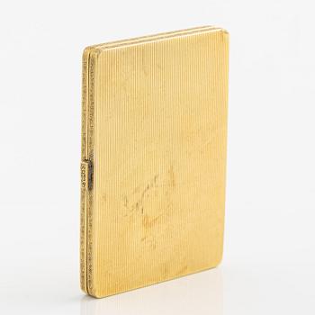 Travel photo album, 18K gold, with monogram.