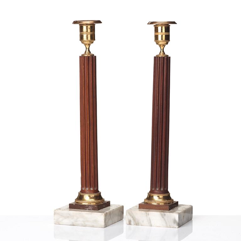 A pair of late Gustavian late 18th century candlesticks.