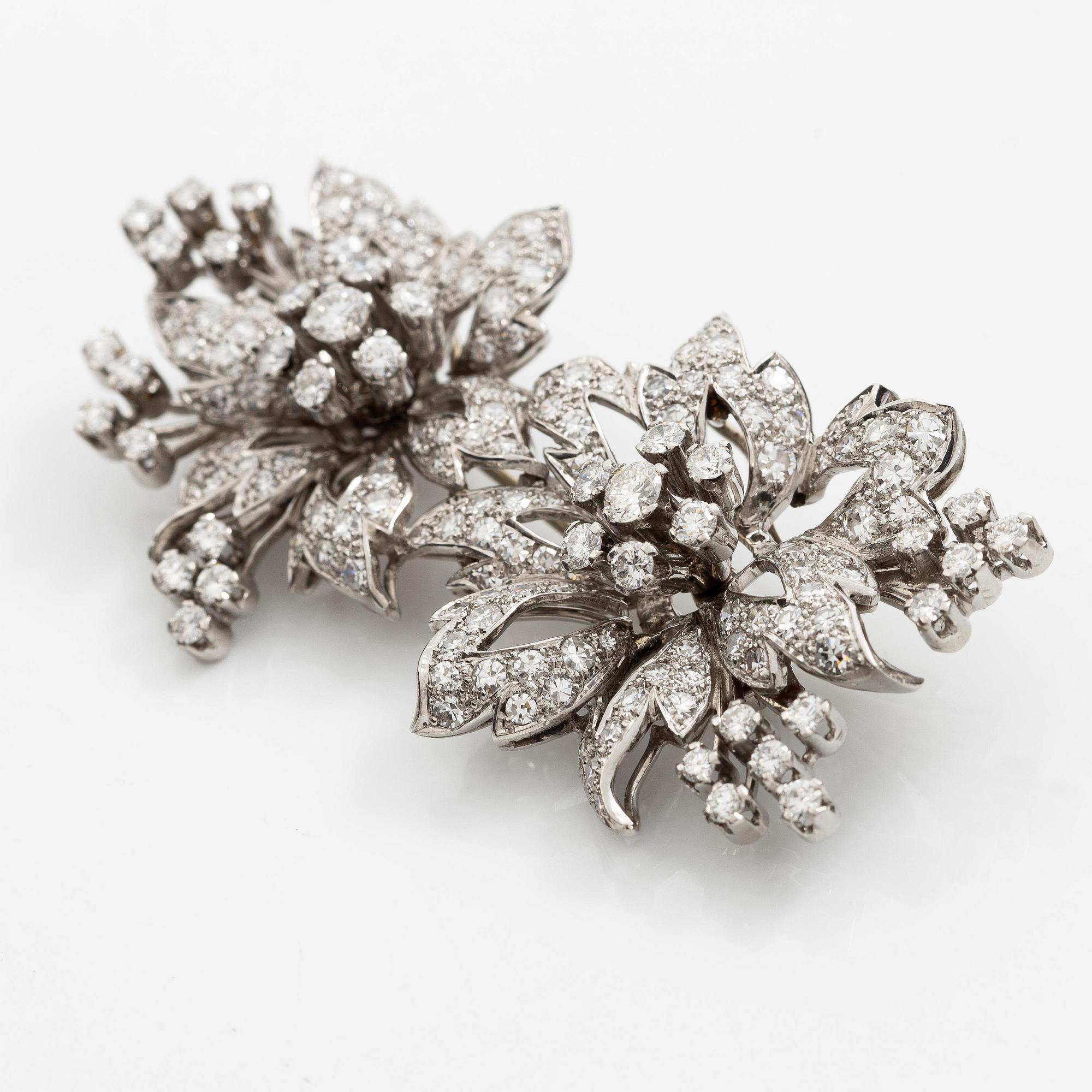 Brosch platina med runda briljant- och åttkantslipade diamanter.