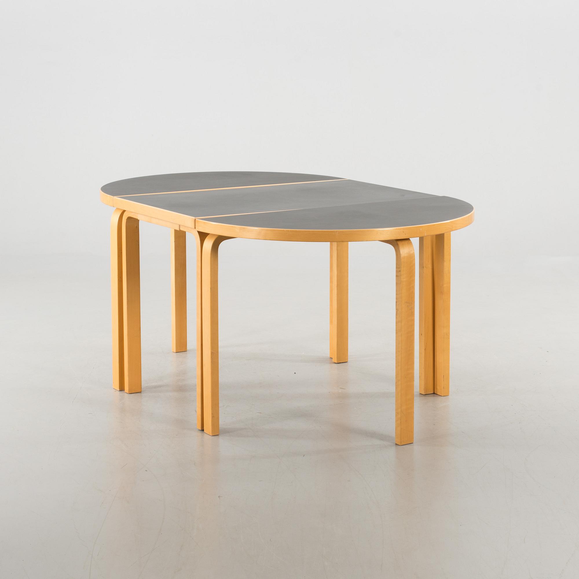 ALVAR AALTO, a 3 piece dining table.