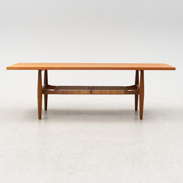 A composite teak coffee table with a rattan shelf, Denmark, 1950/60s.