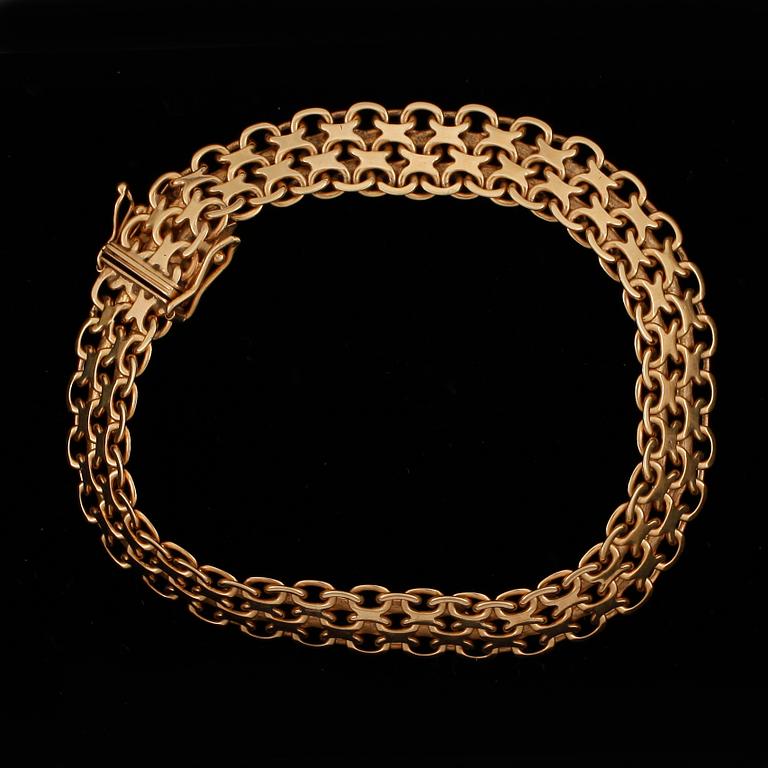 ARMBAND, 18k guld, 1959. Vikt ca 19 g.