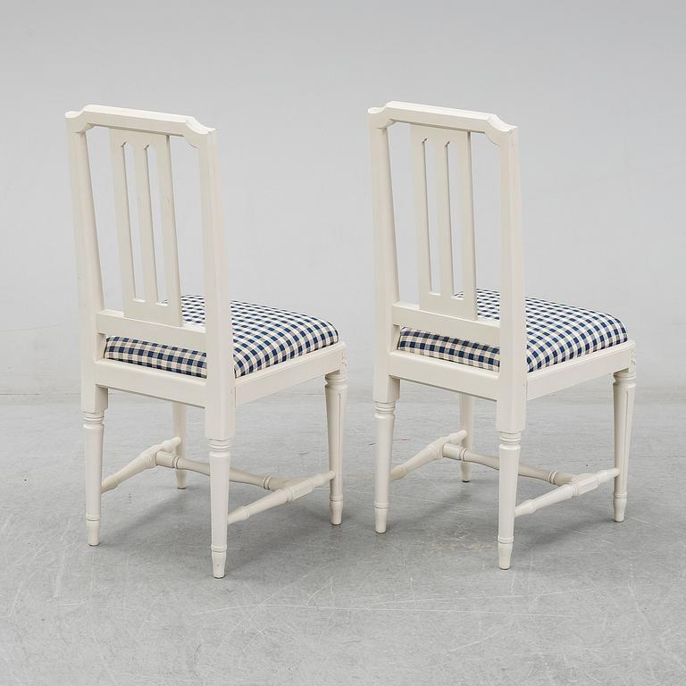 A set of ten 'Odenslunda' IKEA chairs.