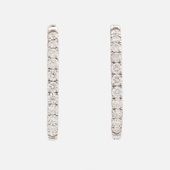 18K white gold and brilliant cut diamond earrings.