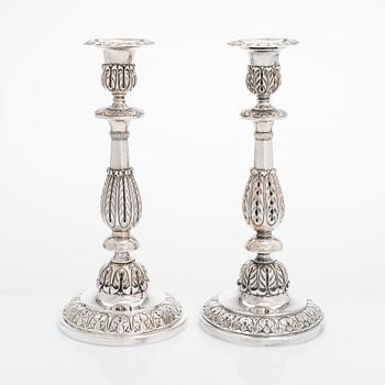 A pair of Russian silver candlesticks, maker's mark of Carl Johan Heyne, Saint Petersburg 1825.