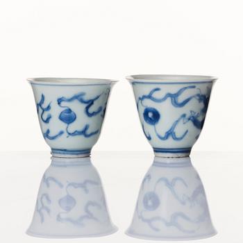 A set of two blue and white wine cups, Ming dynasty, Transition/Chongzhen (1628-44).