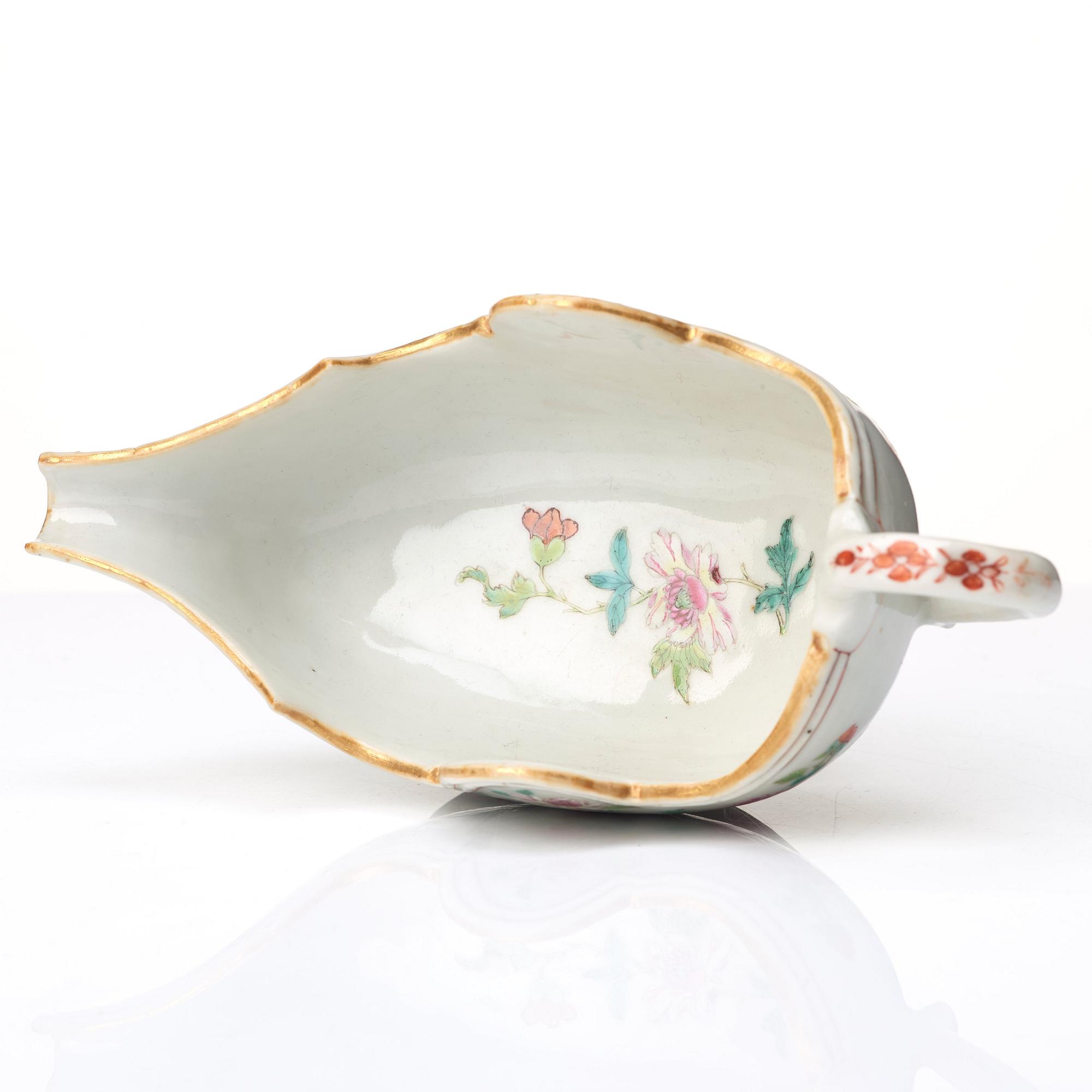 A pair of famille rose 'double peacock sauce boats, Qing dynasty, Qianlong (1736-95).