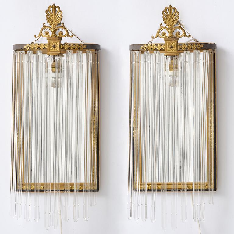 A pair of mirror sconces, 1910's/20's.