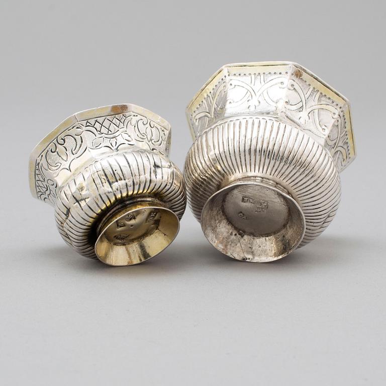 Two Russian 18th century parcel-gilt silver charkas, unidentified makers marks, Moscow.