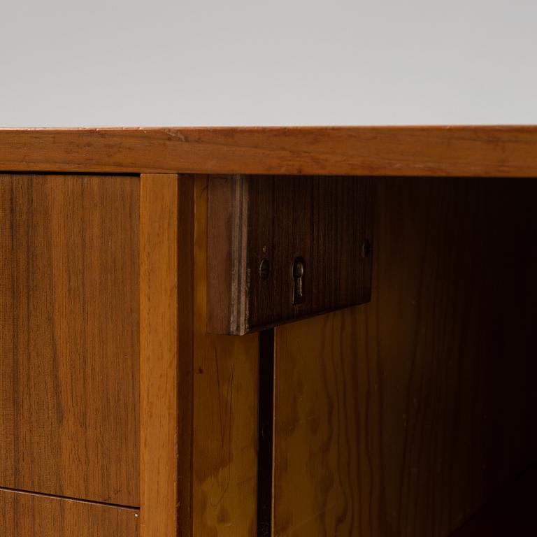 A mahogany, walnut and rosewood veneer set of cabinets with desk, Jönköping Möbelfabriks Aktiebolag. 1950's.