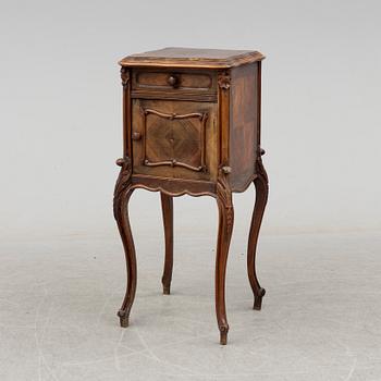 A late 19th century rococo style bedside table.