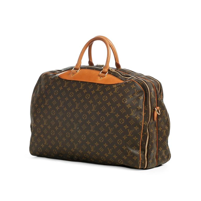 LOUIS VUITTON, a monogram canvas bag / garment cover.