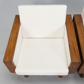A pair of 1960s armchairs.