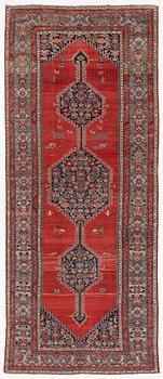 A Malayer runner, west Persia, c. 560 x 200 cm.