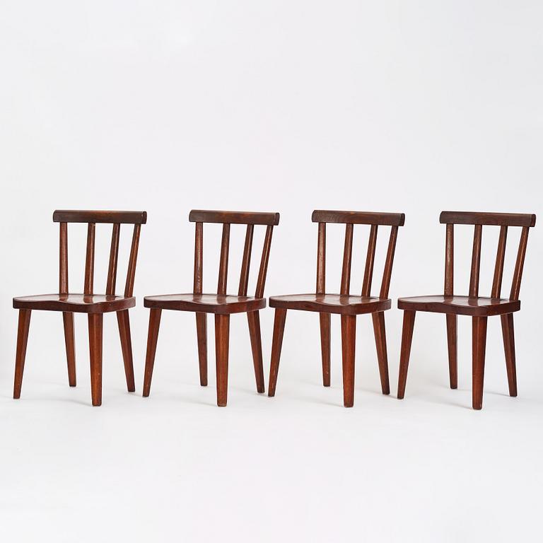 Axel Einar Hjorth, a set of four stained pine 'Utö' chairs, Nordiska Kompaniet Sweden 1930's.