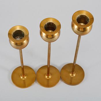 LJUSSTAKAR, 3 st, mässing, "Tulpan", Pierre Forsell, Skultuna, 1900-talets andra hälft.