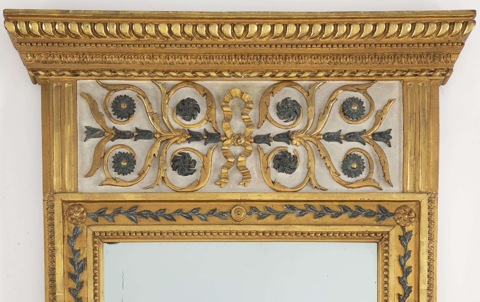 A late Gustavian mirror, circa 1800.