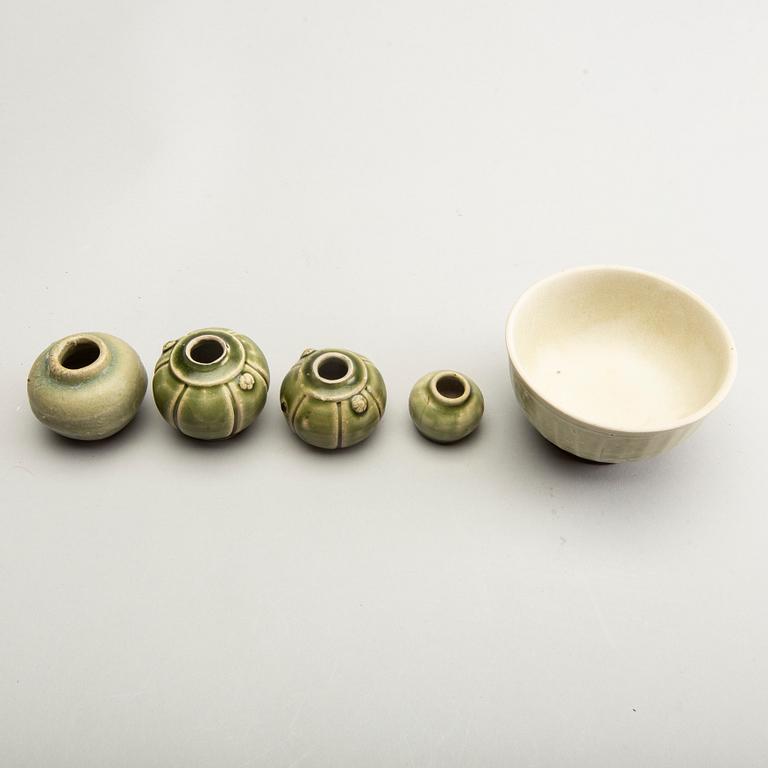 A group of olive green glazed vessels, South East Asia, presumably Thailand.