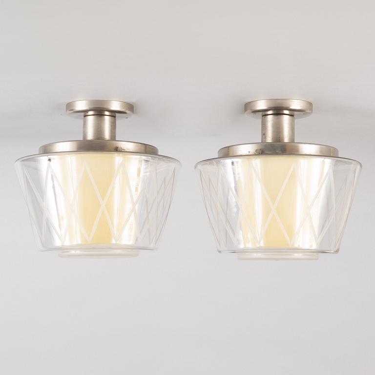 Harald Notini, a pair of ceiling lamps, model "11197", Arvid Böhlmarks 1940s-50s.