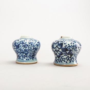 A set of two 19th century blue and white urns and one armorial Qianlong plate.