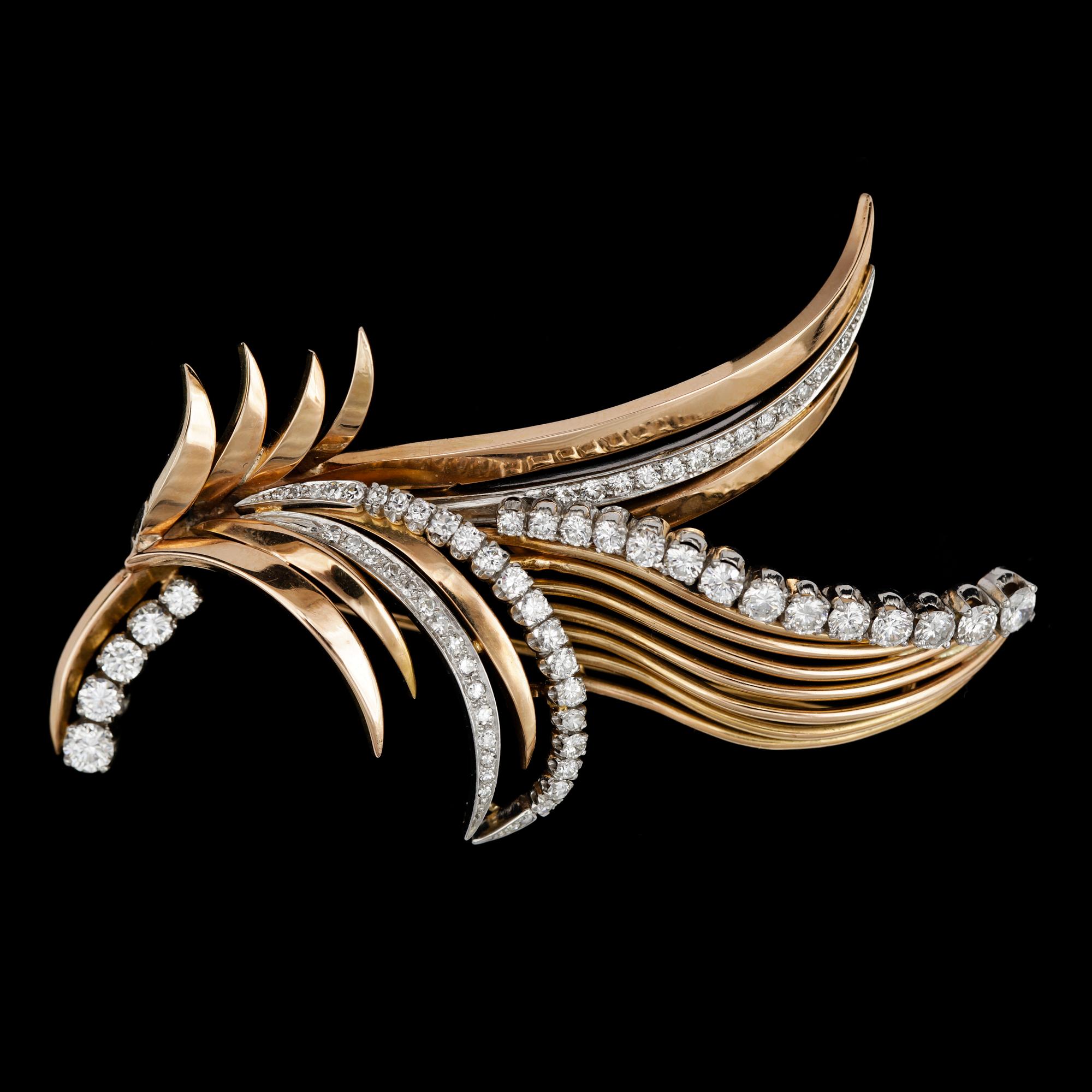 BROSCH, i form av kvist, briljantslipade diamanter, ca 2.50 ct.