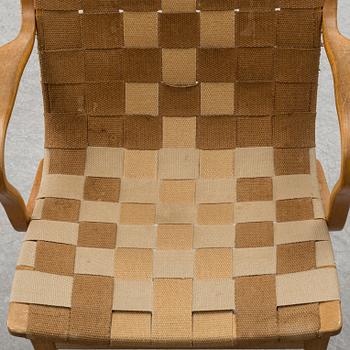 A armchair, model "Eva hög", designed by Bruno Mathsson for Firma Karl Mathsson, dated 1941.