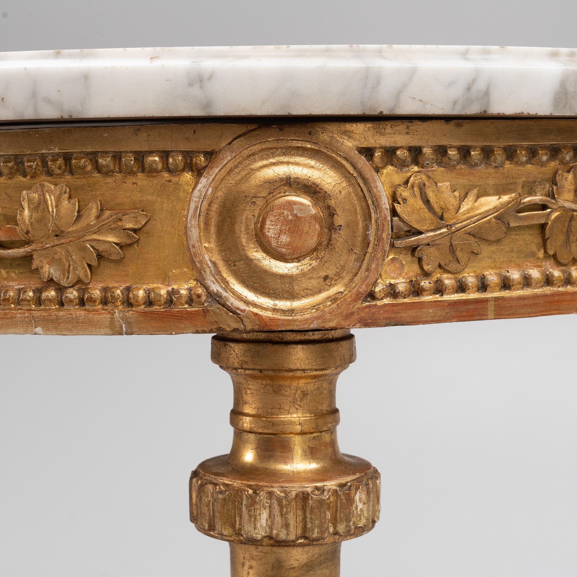 A Gustavian giltwood and white marble console table, Stockholm, late 18th century.