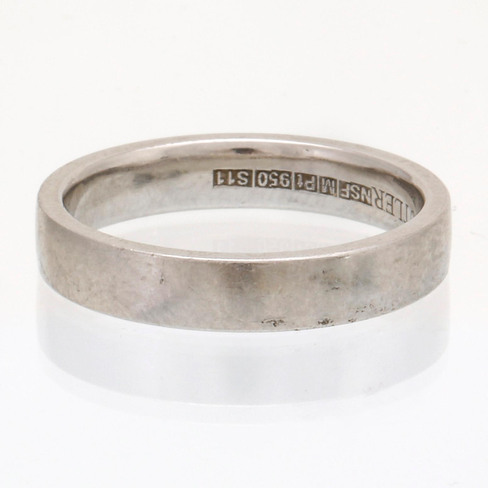 Wedding band platinum, 8,8 g, size approx 58,5, width approx 3 mm, Butler Malmö.